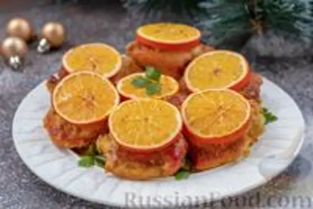 Фото к рецепту: Куриные бёдрышки, запечённые в апельсиново-медовом маринаде
