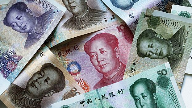 Курс юаня на Мосбирже снизился до 12,219 рубля